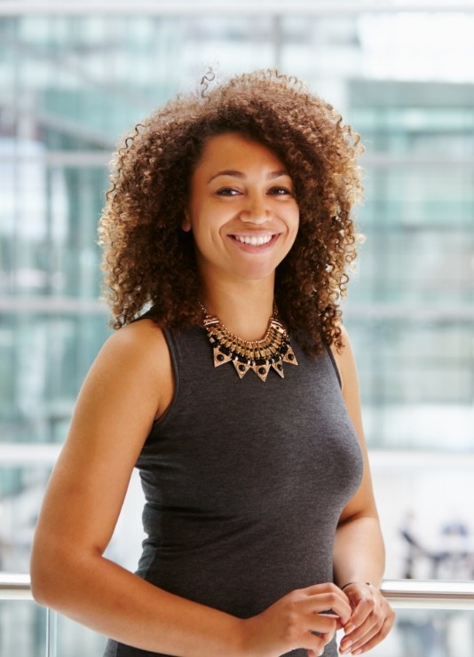 Woman smiling after cosmetic dentistry in Oklahoma City